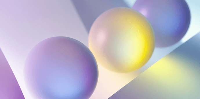 Colorful abstract spheres on a soft gradient background.